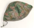 Schweiz, Stahlhelm Tarnbezug  wendbar. gebraucht, repariert 76cm umlaufend gemessen