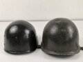 U.S. Army WWII Stahlhelm. Nach dem Krieg bei der U.S. Armee weitergetragen und im Zuge dessen mit frischem Lack, Schweißleder und vermutlich neuerem Kinnriemen versehen. Ungereinigt