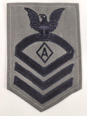 U.S. Navy rating arm badge " A" on grey backing