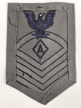 U.S. Navy rating arm badge " A" on grey backing