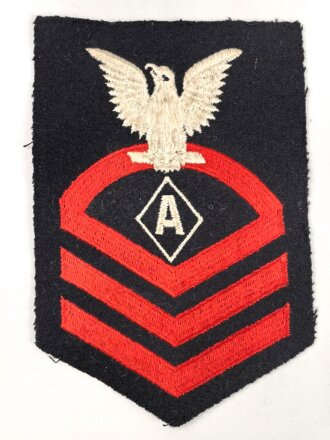 U.S. Navy rating arm badge " A" on dark blue backing