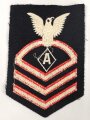 U.S. Navy rating arm badge " A" on dark blue backing