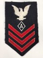 U.S. Navy rating arm badge " A" on dark blue backing