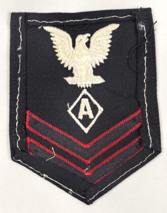 U.S. Navy rating arm badge " A" on dark blue backing