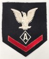 U.S. Navy rating arm badge " A" on dark blue backing