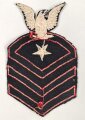 U.S. Navy rating arm badge " A" on dark blue backing