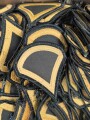 Large lot U.S. Army uniform removed rank insignia