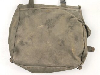 U.S. Army , 1944 dated mussette bag, uncleaned, including a strap and googles