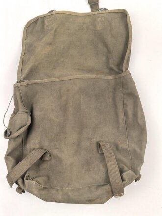 U.S. Army , 1944 dated mussette bag, uncleaned, including a strap and googles