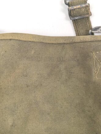 U.S. Army , 1944 dated mussette bag, uncleaned, including a strap and googles