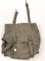 U.S. Army , 1944 dated mussette bag, uncleaned, including a strap and googles