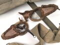 U.S. Army , 1944 dated mussette bag, uncleaned, including a strap and googles