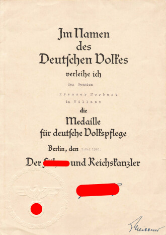 Verleihungsurkunde für die Medaille für deutsche Volkspflege, 1940 für einen Beamten aus Villach. Din A4 mit Blindprägesiegel