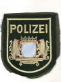 Ärmelabzeichen " Polizei Bayern " , aus einer Dienstjackel ausgeschnitten