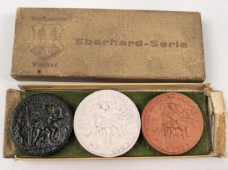 Eberhard Serie" Drei Porzellanmedaillen in stark beschädigtem Etui " Stadtgemeinde Wildbad"