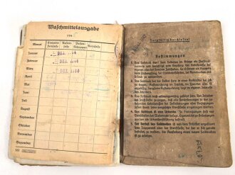 Soldbuch Heer, ausgestellt am 11.6.43 bei Marsch batterie schwere Artillerie Ausbildungs Abteilung 50 ( mot) , dananch Art. Rgt. 40. Eingetragene Pistole Radom, Medaille Winterschlacht im Osten, KVK 2. Klasse mit Schwertern. Wasserschaden