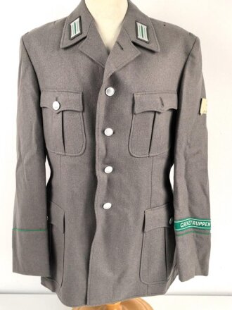 DDR, Uniformjacke für einen Angehörigen der Grenztruppen. Hergestellt 1989, ungetragenes Stück