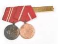 DDR, Medaille Für treue Dienste in den Kampfgruppen in bronze und silber, an unvollständiger Spange