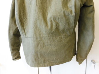 US WWII, M41 Field Jacket. Well used, good size, Original patch but resewn, shoulder width 49 cm, arms length 61 cm